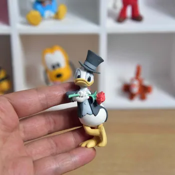 1PCS 7.5 cm Disney rankų modelio papuošalus su gėlių ančiukas Donaldas animacinių filmų lėlės žaislų kolekcijos papuošalai